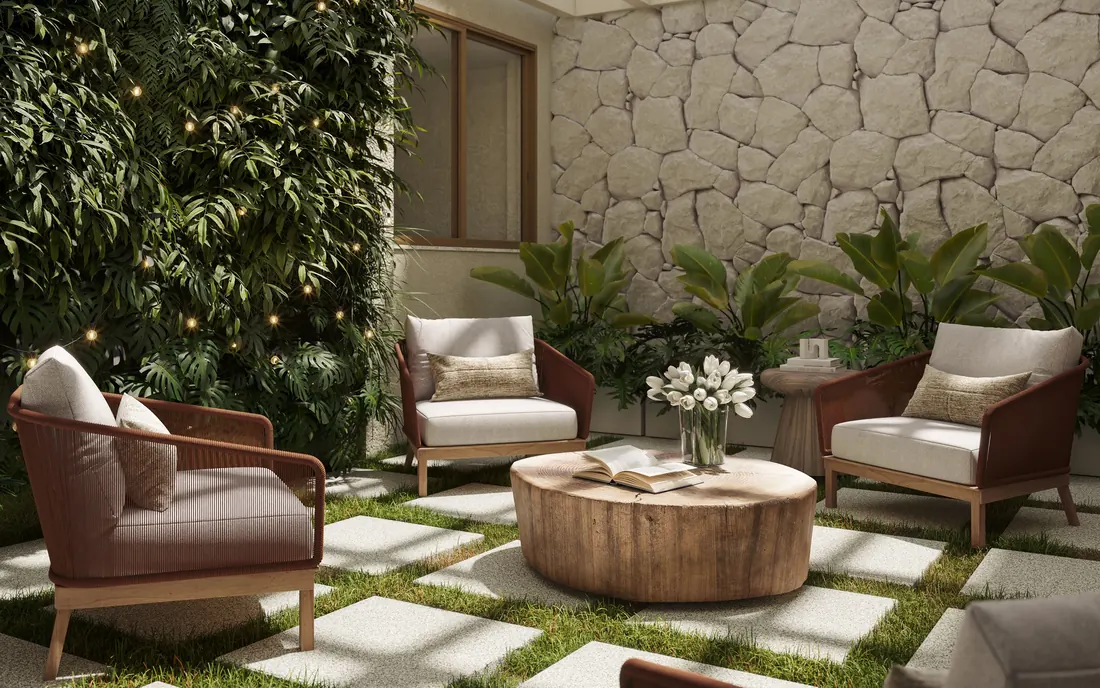 Jardim interno do Be in Rio Nascimento Silva 45, com poltronas, jardim vertical e pergolado